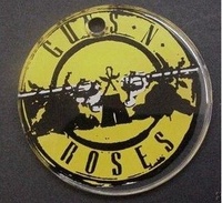 Image # 60595: Guns N' Roses Promotional Plastic 
(The estimated size of this plastic is that of a USA half dollar.)