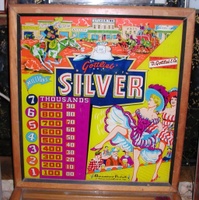 Image # 30117: Silver Backglass 
(The blue area around the game name appears to have been repainted, removing the 's' after the apostrophe as well as the 'periods' between V-E-R. This image is included here to show its other detail.)