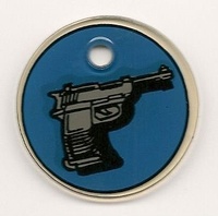 Image # 46254: Spy Hunter Promo Key Fob 
(A key fob was included with each sheet of original playfield plastics. It measures 3.5 cm in diameter by 2 mm in thickness. The hole measures 5 mm in diameter.)