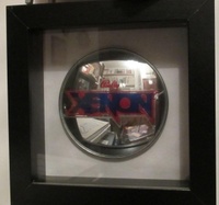 Image # 53634: Xenon Promotional Item 
(Given away at trade shows. The mirrors on production games are not labeled.)