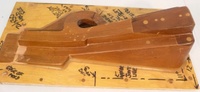 Image # 70323: Medieval Madness Right Ramp Prototype Mold 
(This solid wood tool was used to prototype thermoform the right plastic ramp (part number 03-9680.8). It measures approximately 24 x12 x 9 inches including the wood base.)