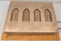 Image # 70318: Monster Bash Coffin Cover Mold 
(This tool was used to thermoform the Monster Bash Mummy Coffin cover (part number 03-9865.2). It is the original production aluminum tooling.)