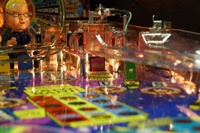 Image # 36262: Wheel Of Fortune Early Production on Assembly Line 
(Images 36235 through 36269 show one of the first ten or so games being assembled at the factory. Some playfield parts may have not yet been installed on this playfield.)