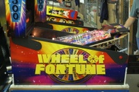 Image # 36269: Wheel Of Fortune Early Production on Assembly Line 
(Images 36235 through 36269 show one of the first ten or so games being assembled at the factory. Some playfield parts may have not yet been installed on this playfield.)