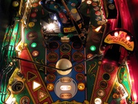 Image # 47839: Cue Ball Wizard Illuminated Middle Playfield 
(The center plastic belonging under the pivoting ball shooter is missing from this game.)