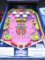 Image # 48473: Doodle Bug Early Production Playfield 
(The pop bumper caps and the yellow rollover button below the doodle bug are not original to this game. Serial number 65420.)