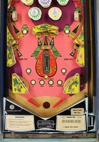 Image # 48552: Doodle Bug Lower Early Production Playfield 
(The pop bumper caps and the yellow rollover button below the doodle bug are not original to this game. Serial number 65420.)