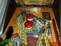 Image # 49217: Escape from the Lost World Upper Playfield Exposed  
(The elevated playfield has been hinged upward in this view.)