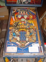 Image # 32027: Frontier Playfield 
(A white stcker has been added after-factory to the center stand-up target. The yellow standup target is not original to this game.)